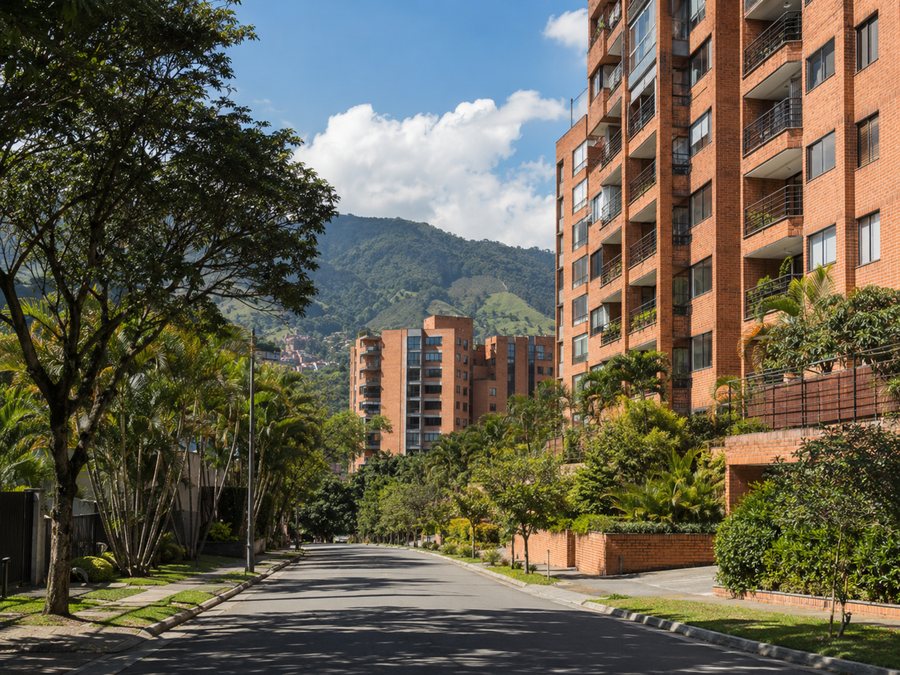 Envigado residential street with mountain backdrop